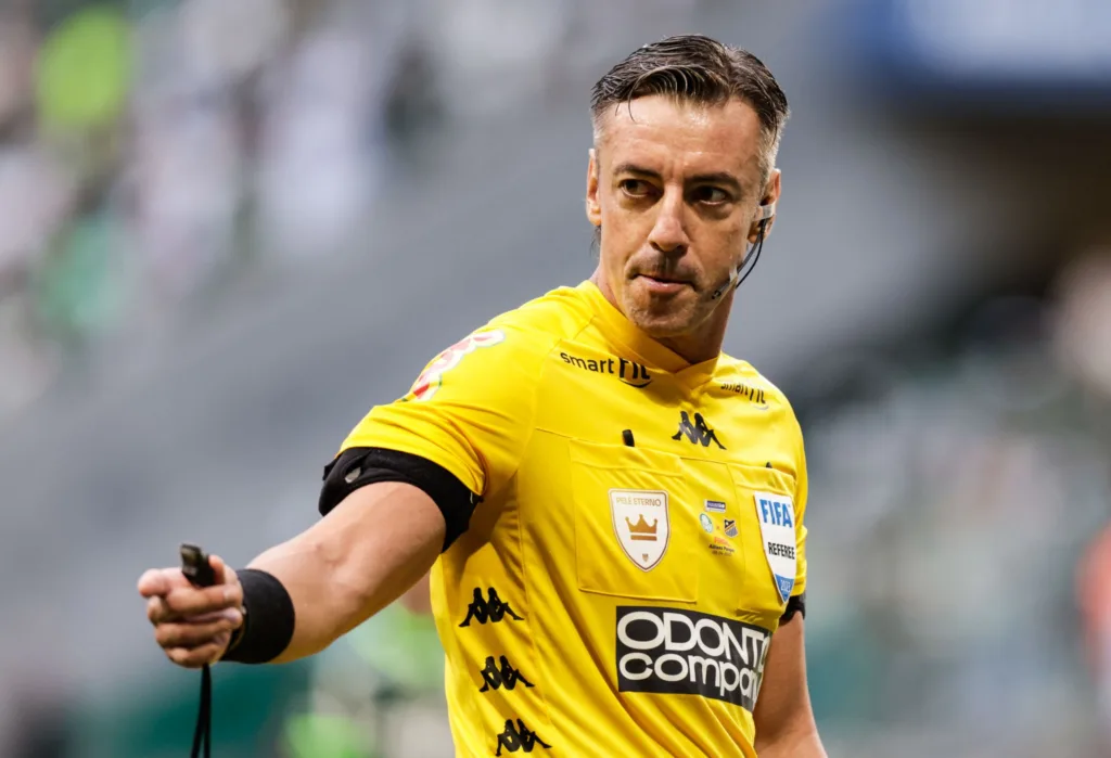 SAO PAULO, BRAZIL - APRIL 09: Referee Raphael Claus gestures during the second leg of the Paulistao 2023 final between Palmeiras and Agua Santa at Allianz Parque on April 09, 2023 in Sao Paulo, Brazil. (Photo by Alexandre Schneider/Getty Images)