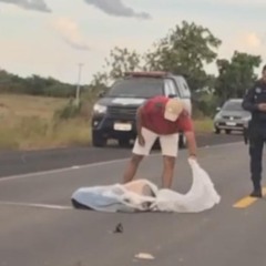 Vítima caída na pista (Foto: Divulgação) 