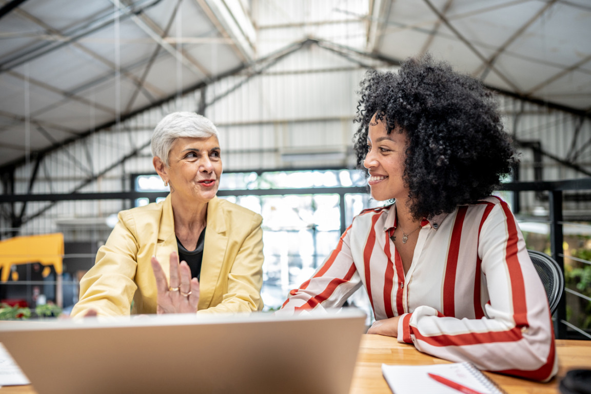 Businesswomen talking on a meeting at office
