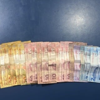 Criança perdida leva à apreensão de drogas e dinheiro em RR
