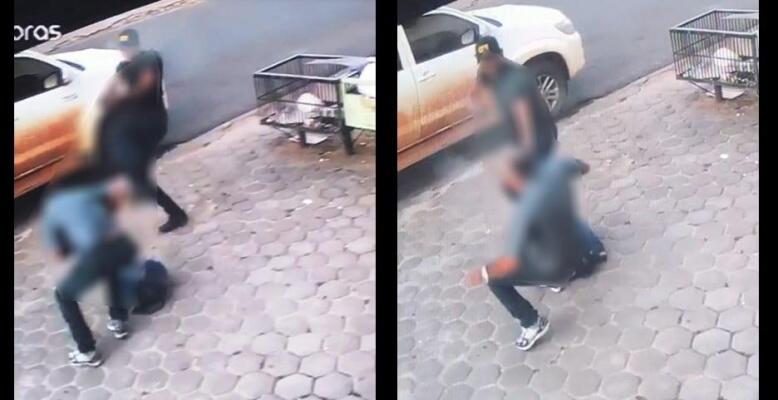 O momento em que o bandido ataca o empresário no centro da cidade (Foto: Imagem)