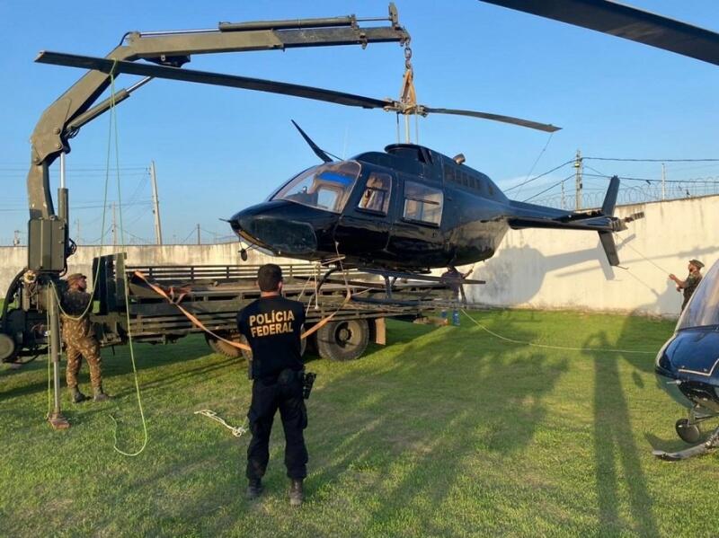 No local, um homem se identificou como responsável pelos hangares e foi preso (Foto: Divulgação)