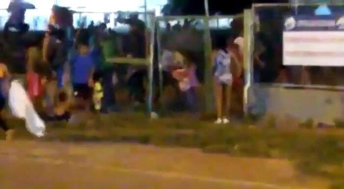 Vídeo gravado com baixa qualidade mostra correria de migrantes (Foto: Reprodução)