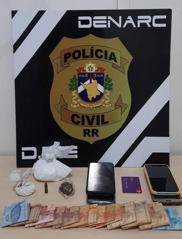 Além do dinheiro foi apreendida uma munição, intacta, de calibre 32”. (Foto: Divulgação)