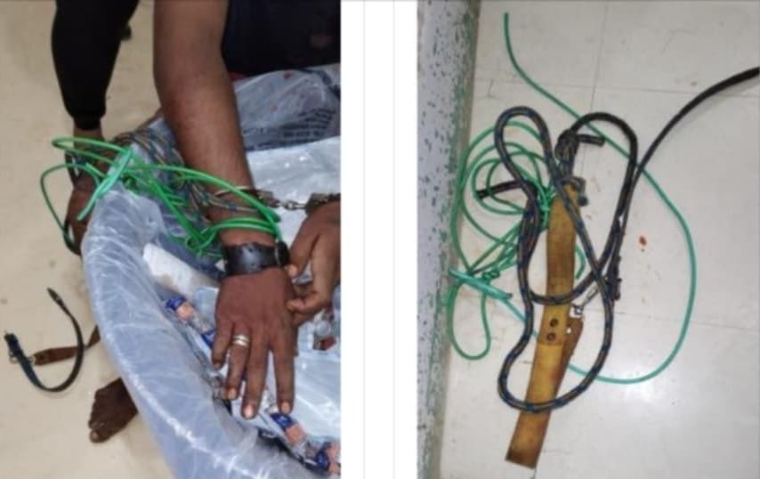 O infrator foi amarrado com cordas, fios elétricos e uma coleira (Foto: Divulgação)